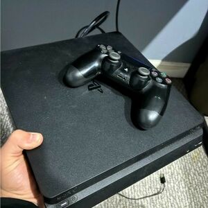 Sony PlayStation 4 Console with Black DualShock Controller